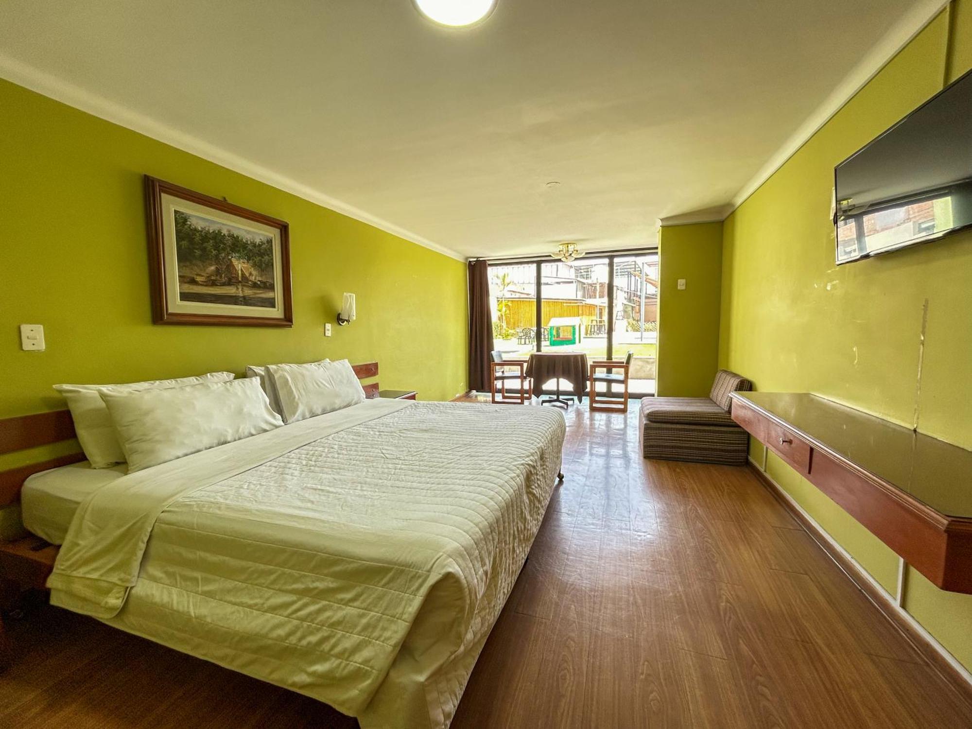 Holiday Suites Tacna Pokoj fotografie